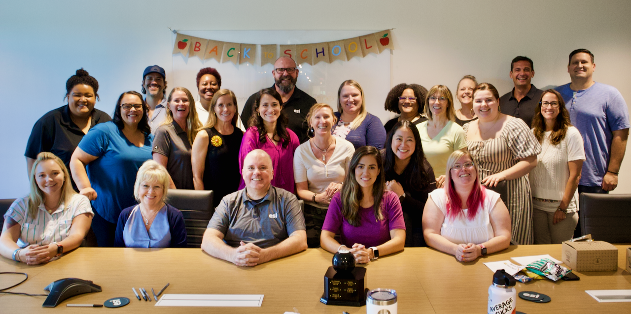 ESI team photo in conference room